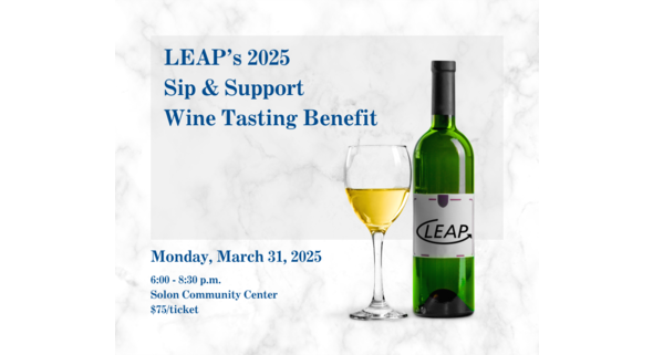 Glass of wine & wine bottle with LEAP logo.