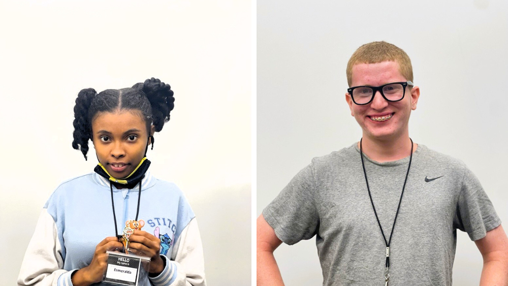 Two people smiling side-by-side. 