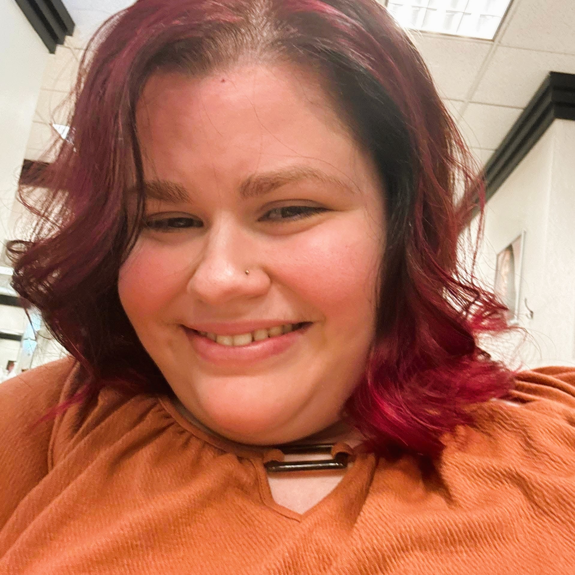 A selfie of a girl smiling. 